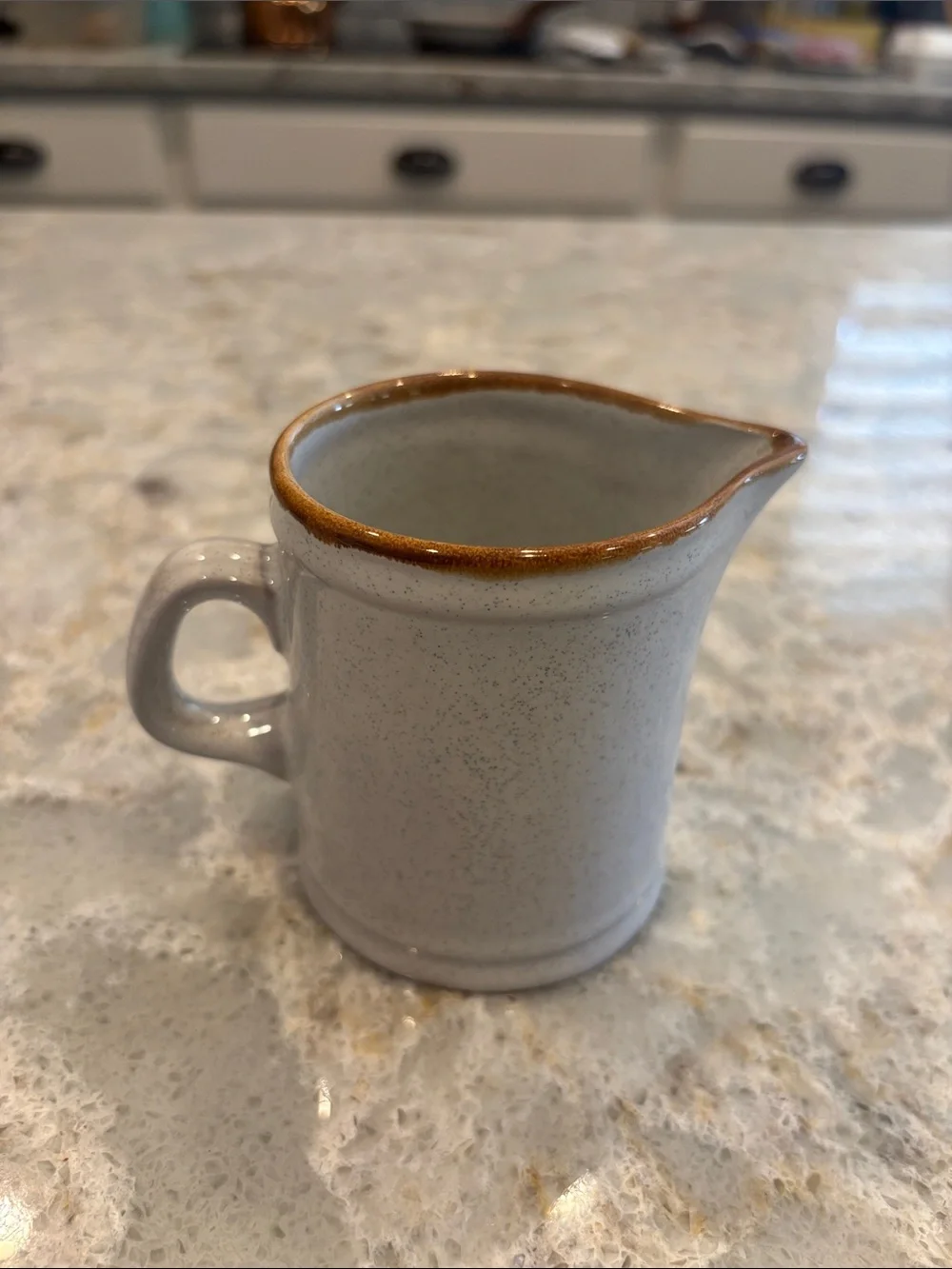 Vintage Stoneware Nikko Stone Creamer in Speckeled off white. No chips/cracks